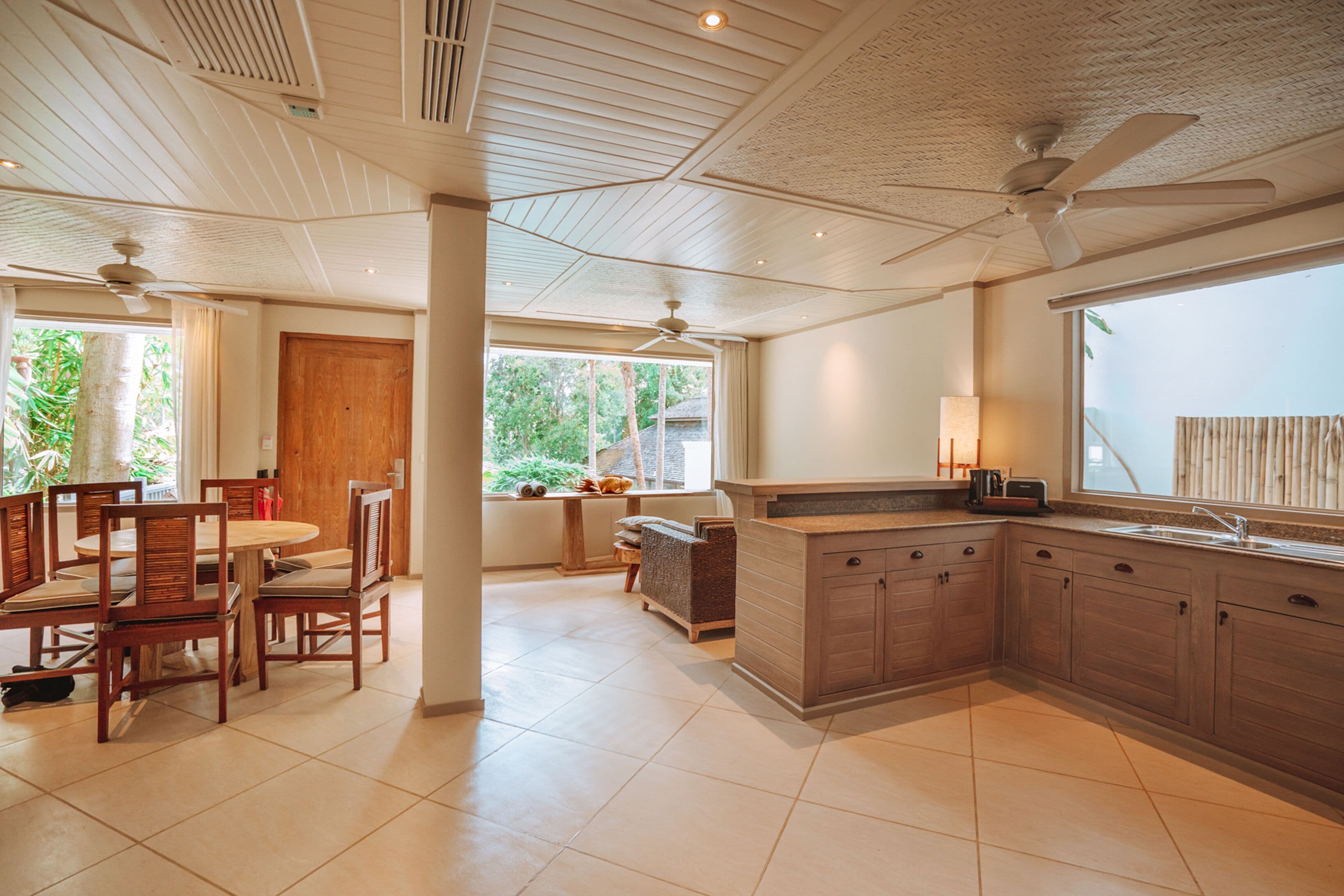 two bedroom pool villa | living area | 43-inch smart tv with satellite channels, tv, fireplace