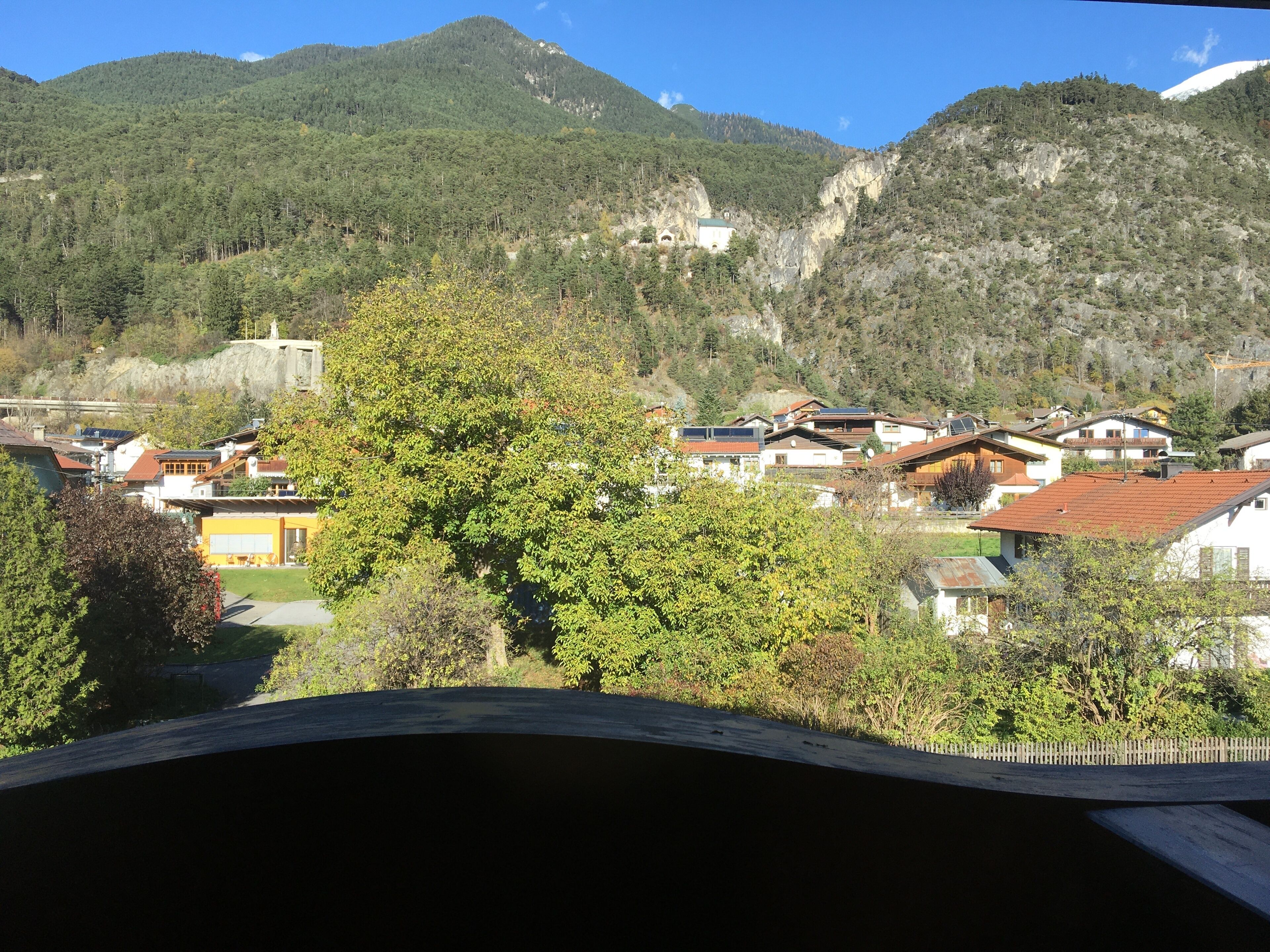 A mountainous landscape with a village.