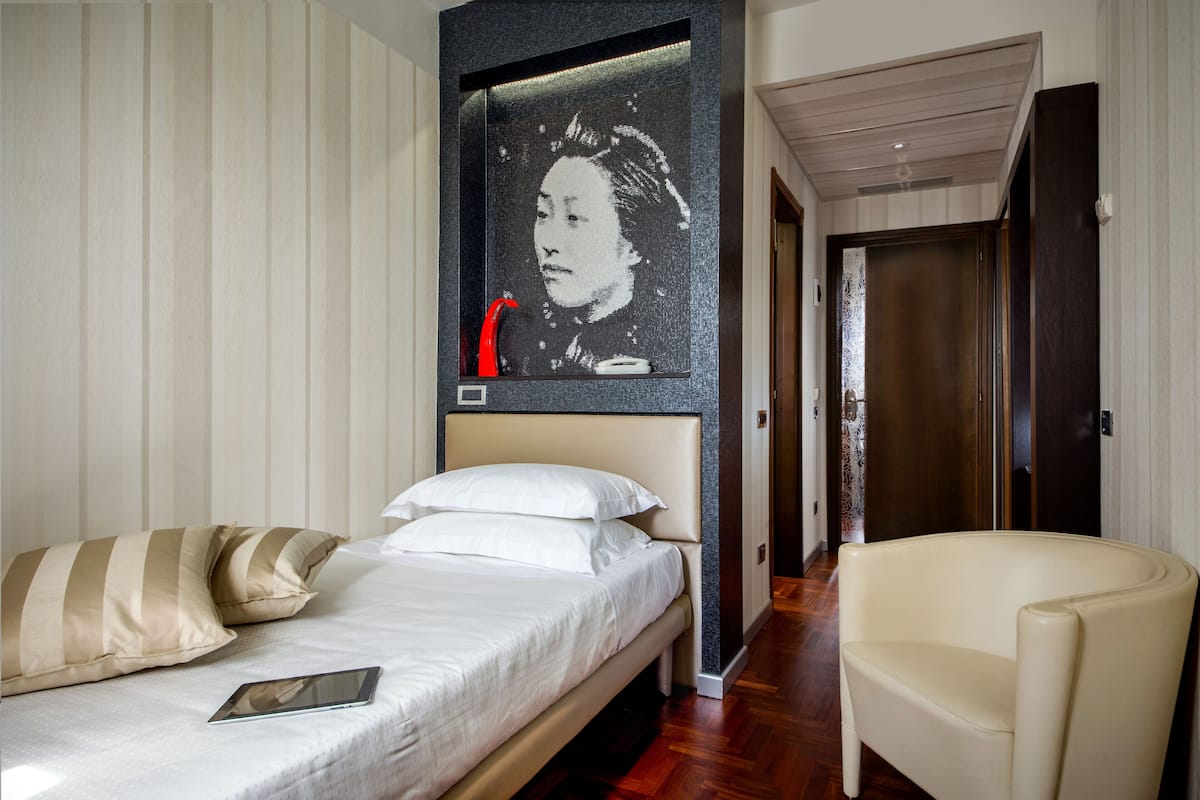 Chambre Simple Supérieure | Literie de qualité supérieure, minibar, coffres-forts dans les chambres