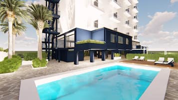 Piscine extérieure, chaises longues