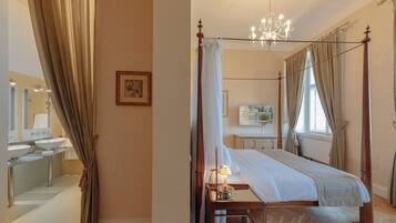 Luxury Suite, 1 King Bed, Balcony | Bathroom | Free toiletries, hair dryer, bathrobes, slippers