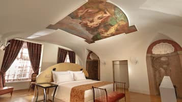 Hypo-allergenic bedding, free minibar items, in-room safe