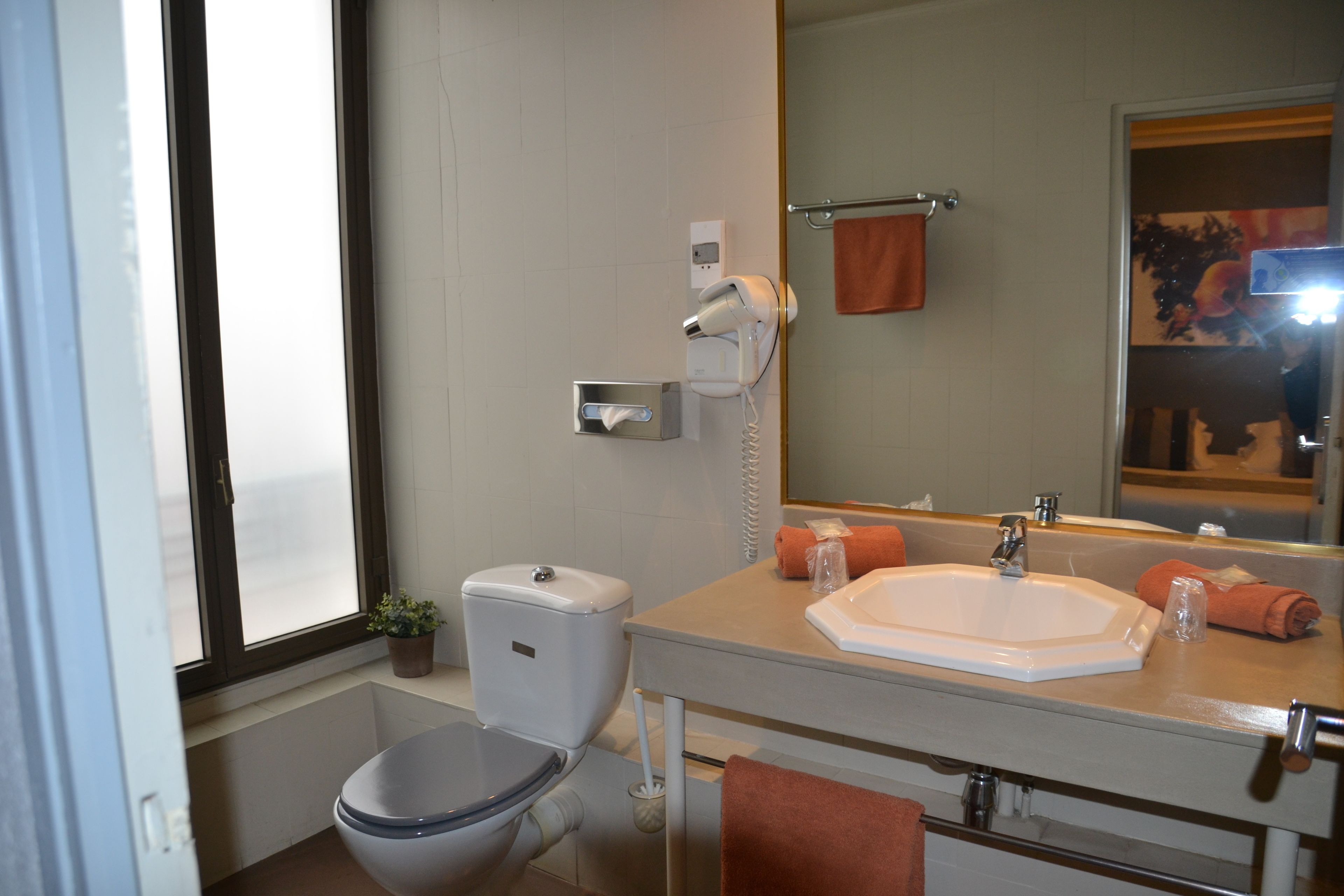 superior double room | bathroom | free toiletries, hair dryer, towels