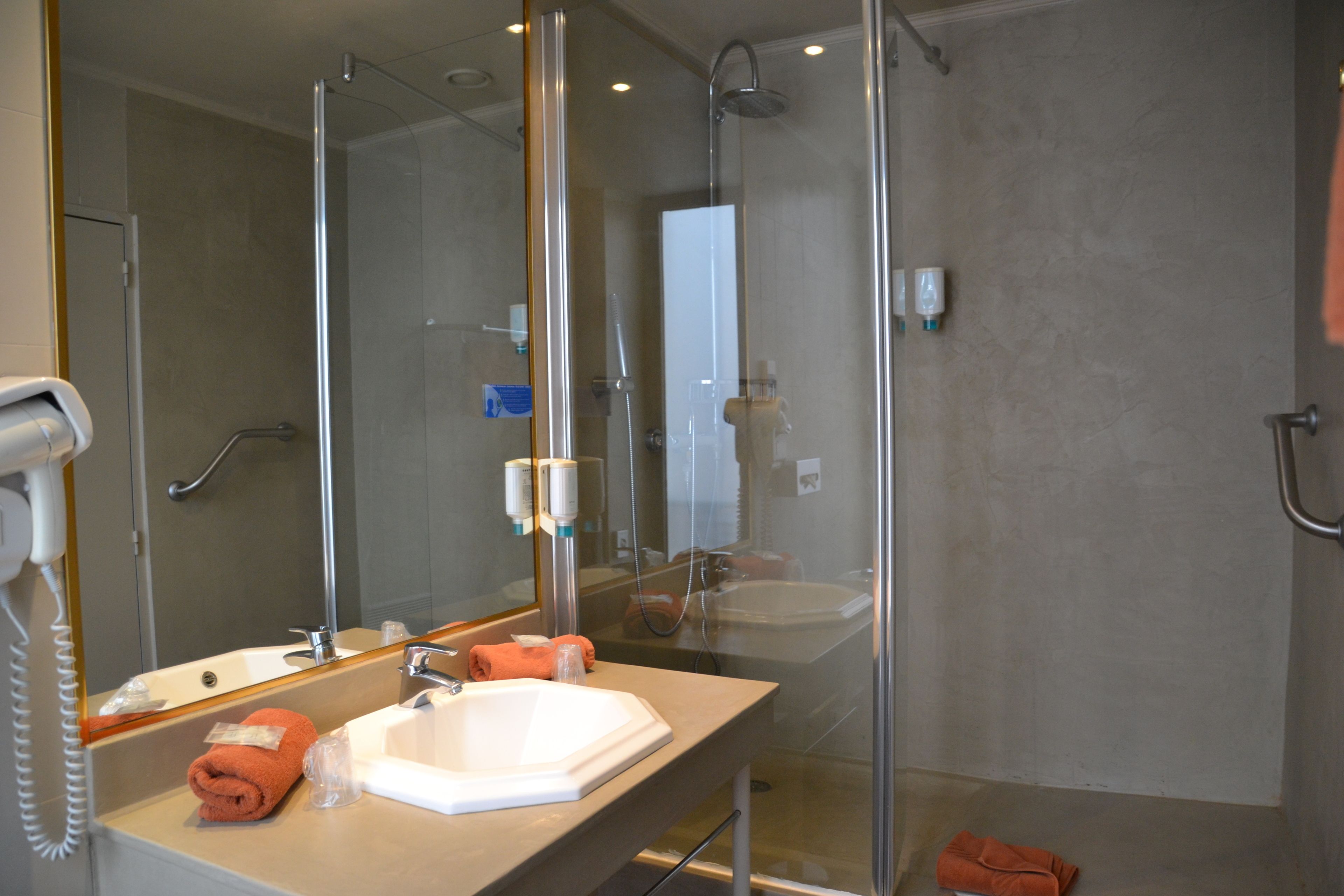superior twin room | bathroom | free toiletries, hair dryer, towels