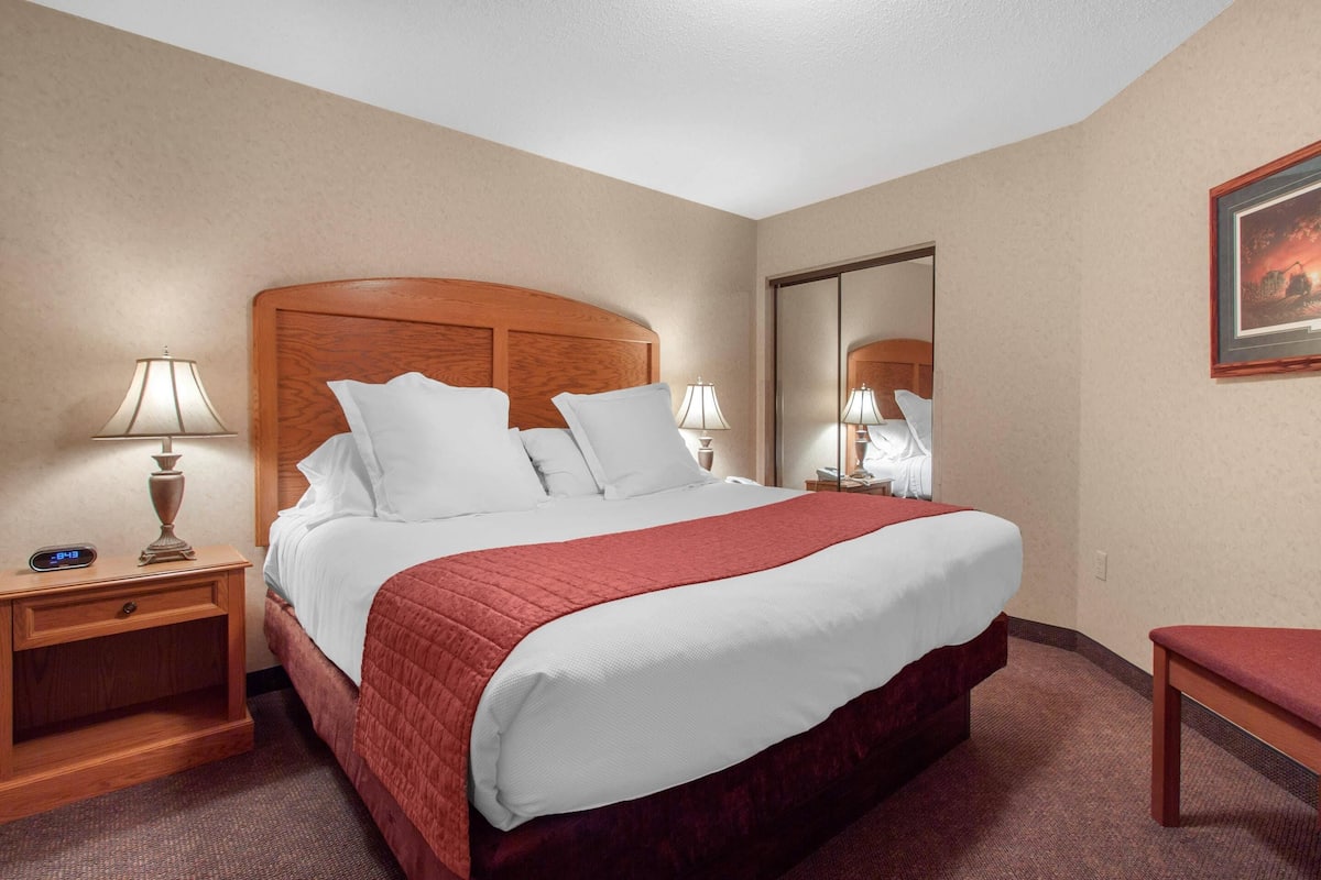 Desk, laptop workspace, blackout curtains, iron/ironing board