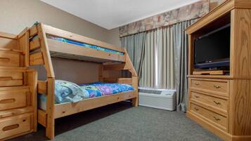 Suite, 1 King Bed, Non Smoking | Desk, laptop workspace, blackout drapes, iron/ironing board