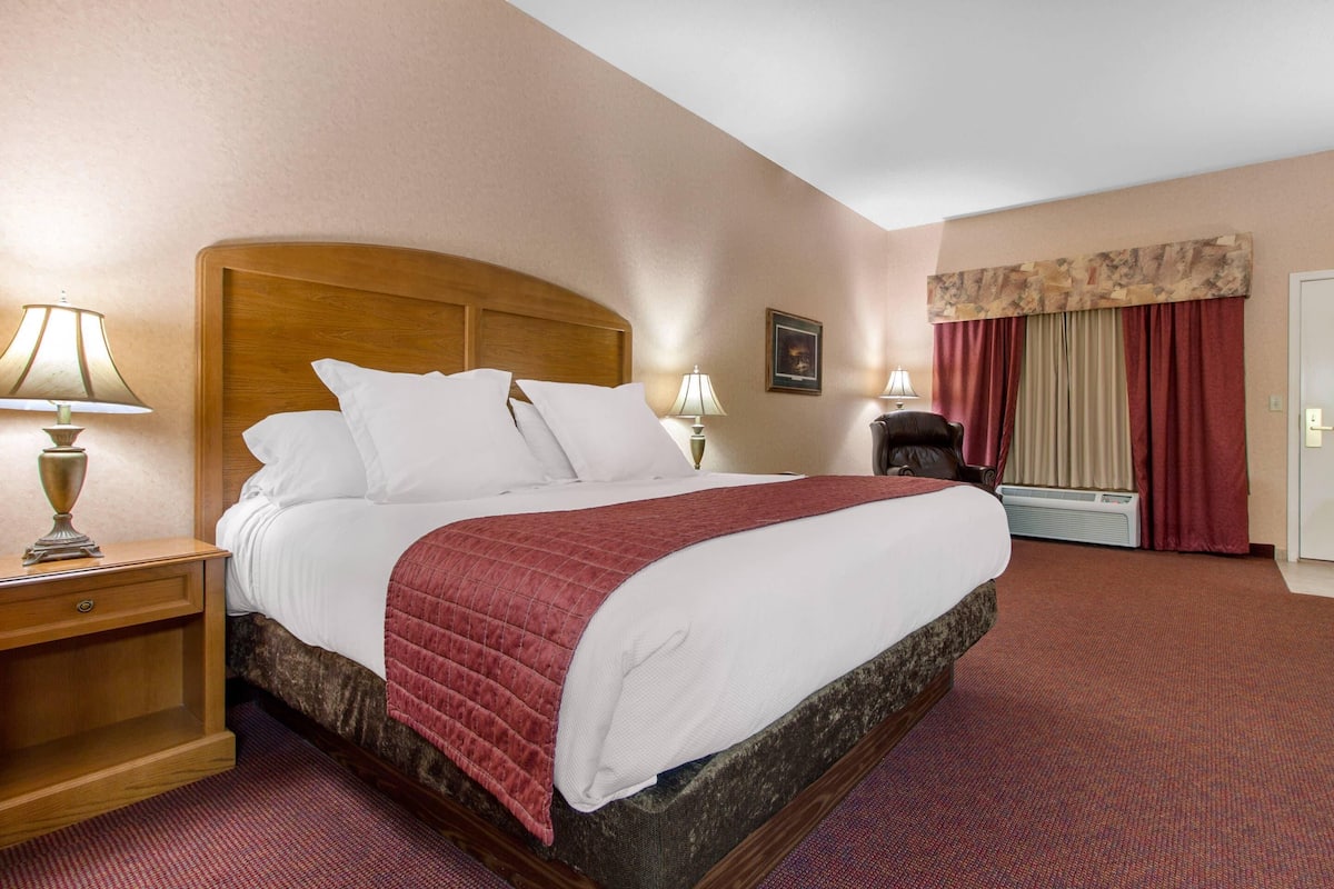 Desk, laptop workspace, blackout curtains, iron/ironing board