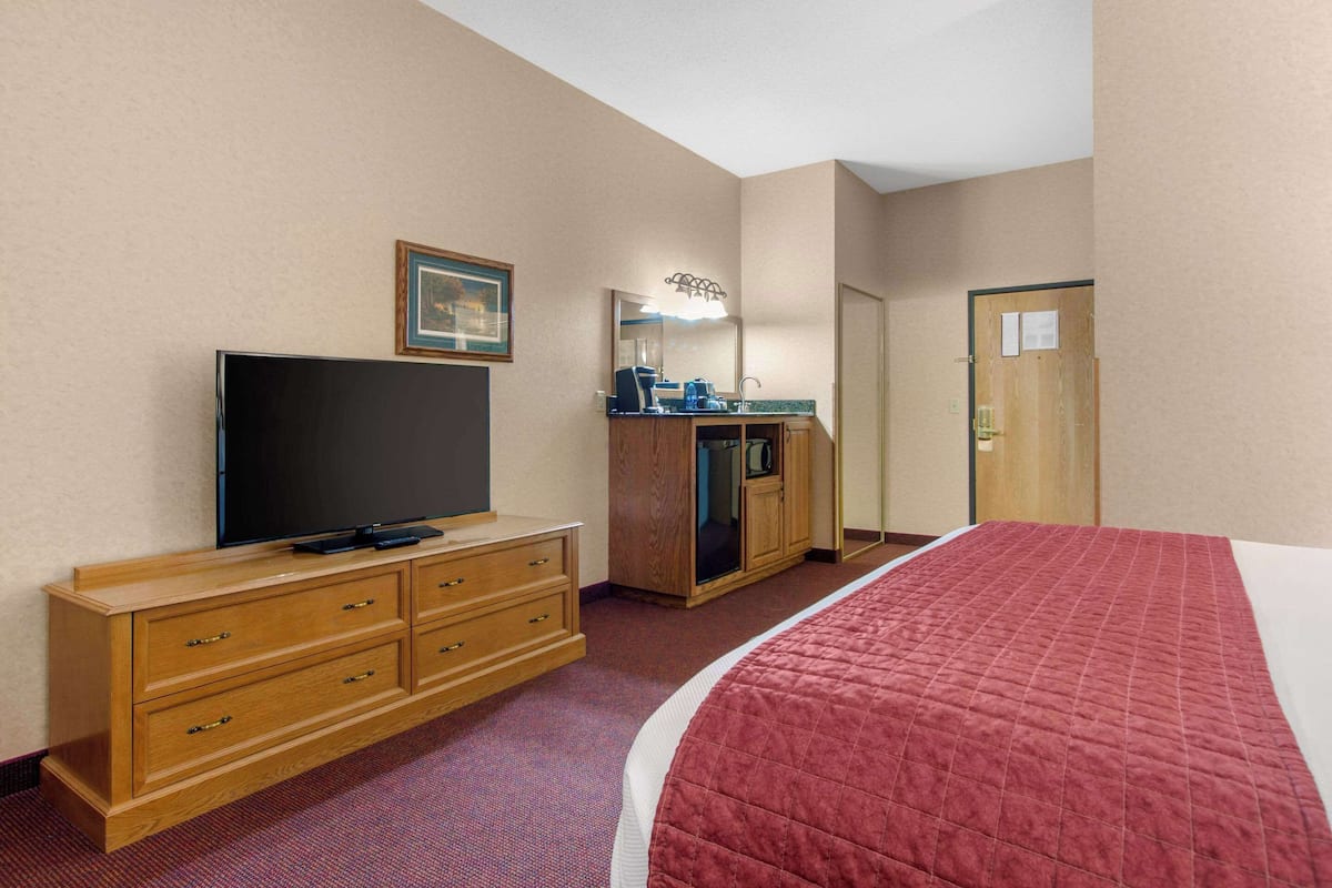 Desk, laptop workspace, blackout curtains, iron/ironing board