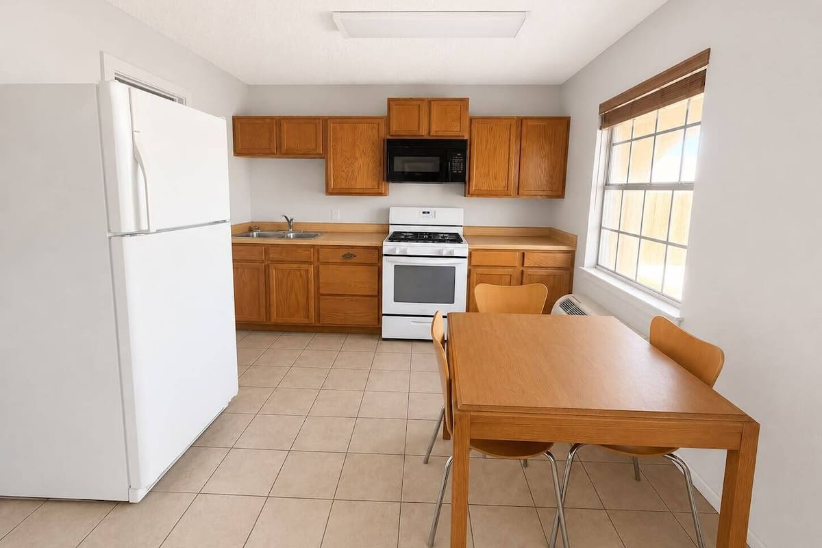 Studio Suite, Non Smoking, Kitchenette | Desk, laptop workspace, blackout drapes, iron/ironing board (on request)