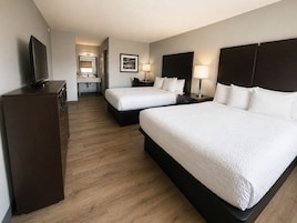 Habitación estándar doble, 2 camas de matrimonio, fumadores | Escritorio, cortinas opacas, tabla de planchar con plancha y wifi gratis