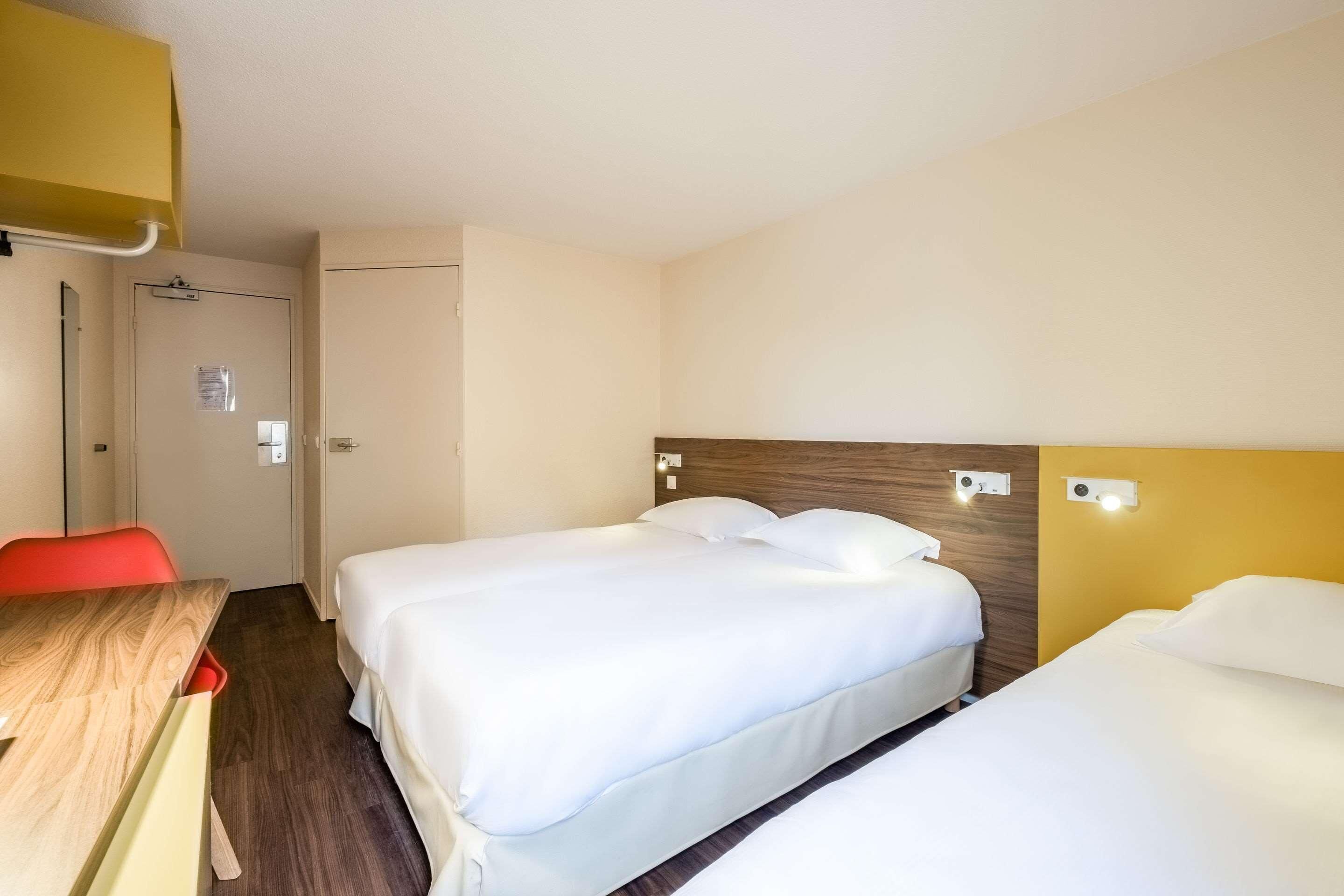 Desk, blackout drapes, WiFi (free), bed sheets