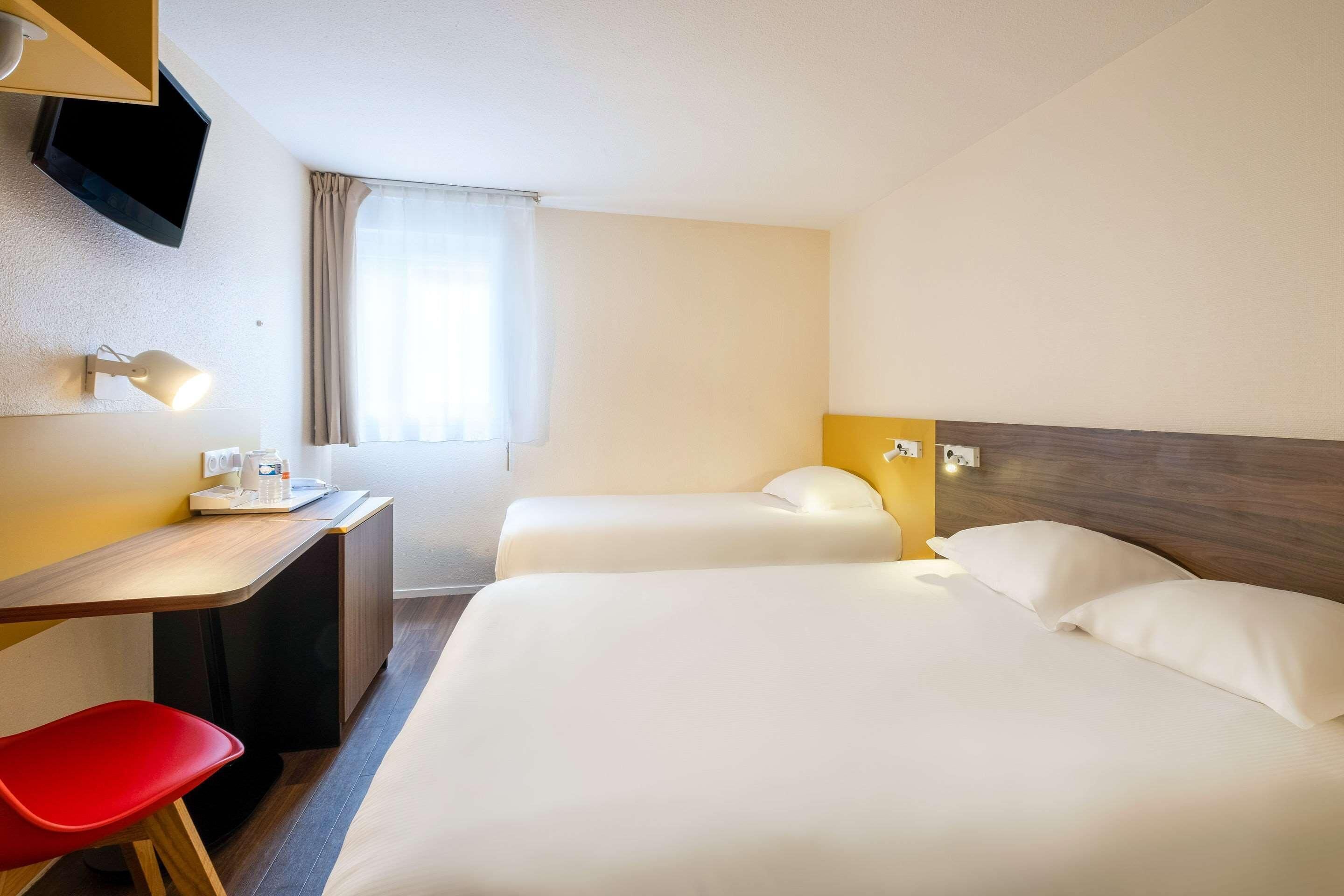 Desk, blackout drapes, WiFi (free), bed sheets