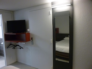Desk, soundproofing, iron/ironing board, free cribs/infant beds