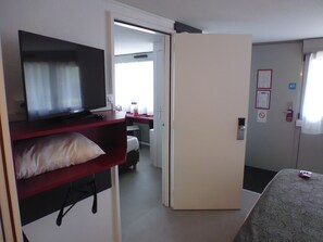 Desk, soundproofing, iron/ironing board, free cots/infant beds