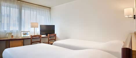 Premium bedding, desk, blackout curtains, soundproofing