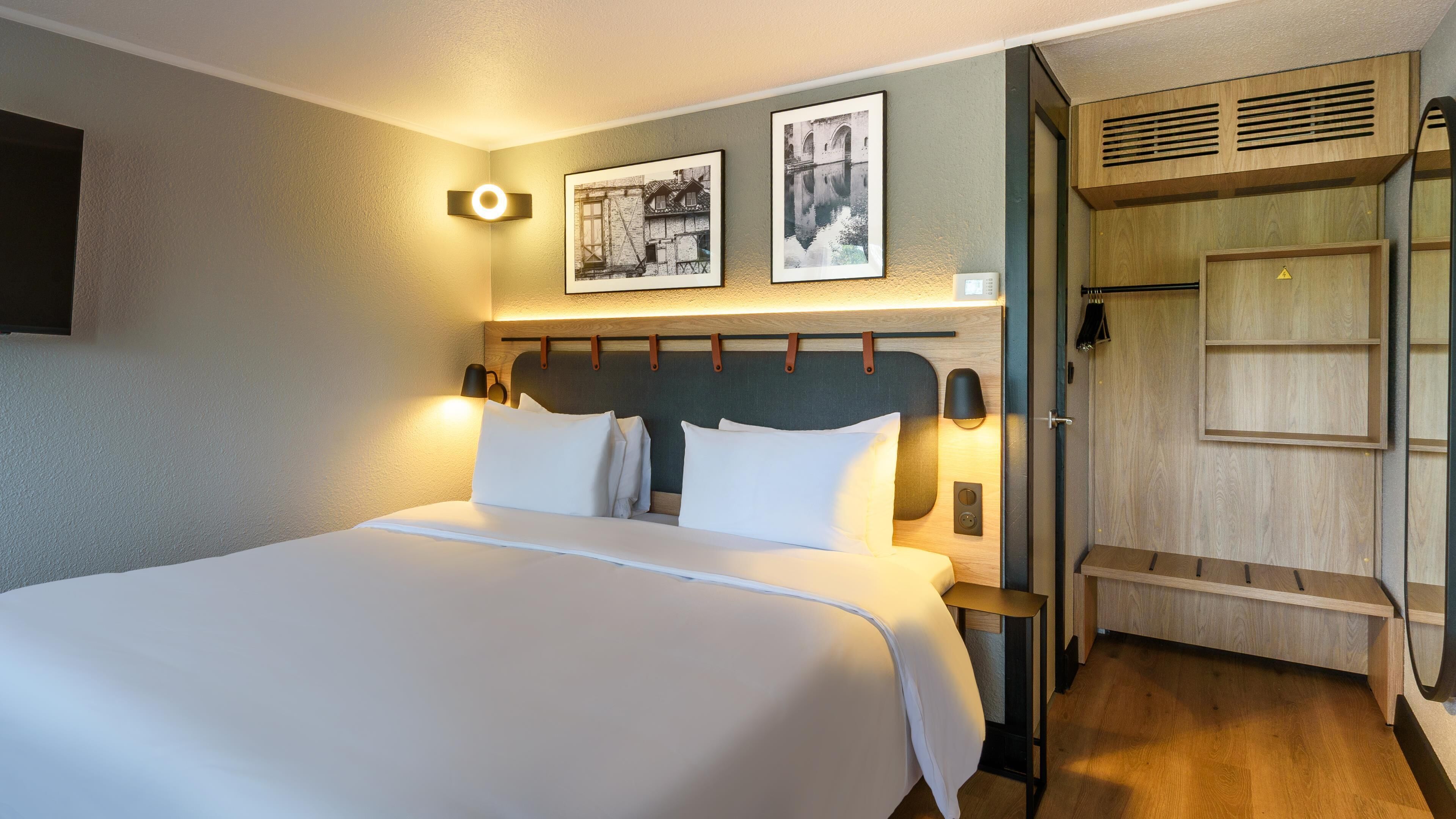 Premium bedding, desk, blackout drapes, iron/ironing board