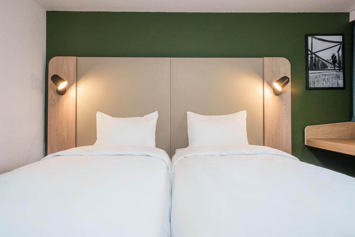Premium bedding, desk, blackout curtains, soundproofing