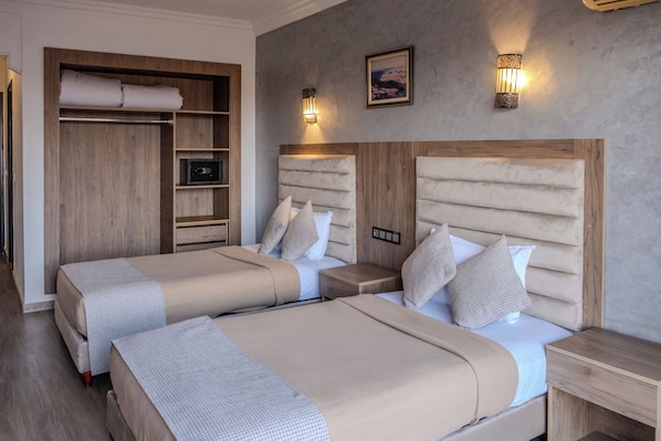 Coffres-forts dans les chambres, Wi-Fi gratuit, draps fournis