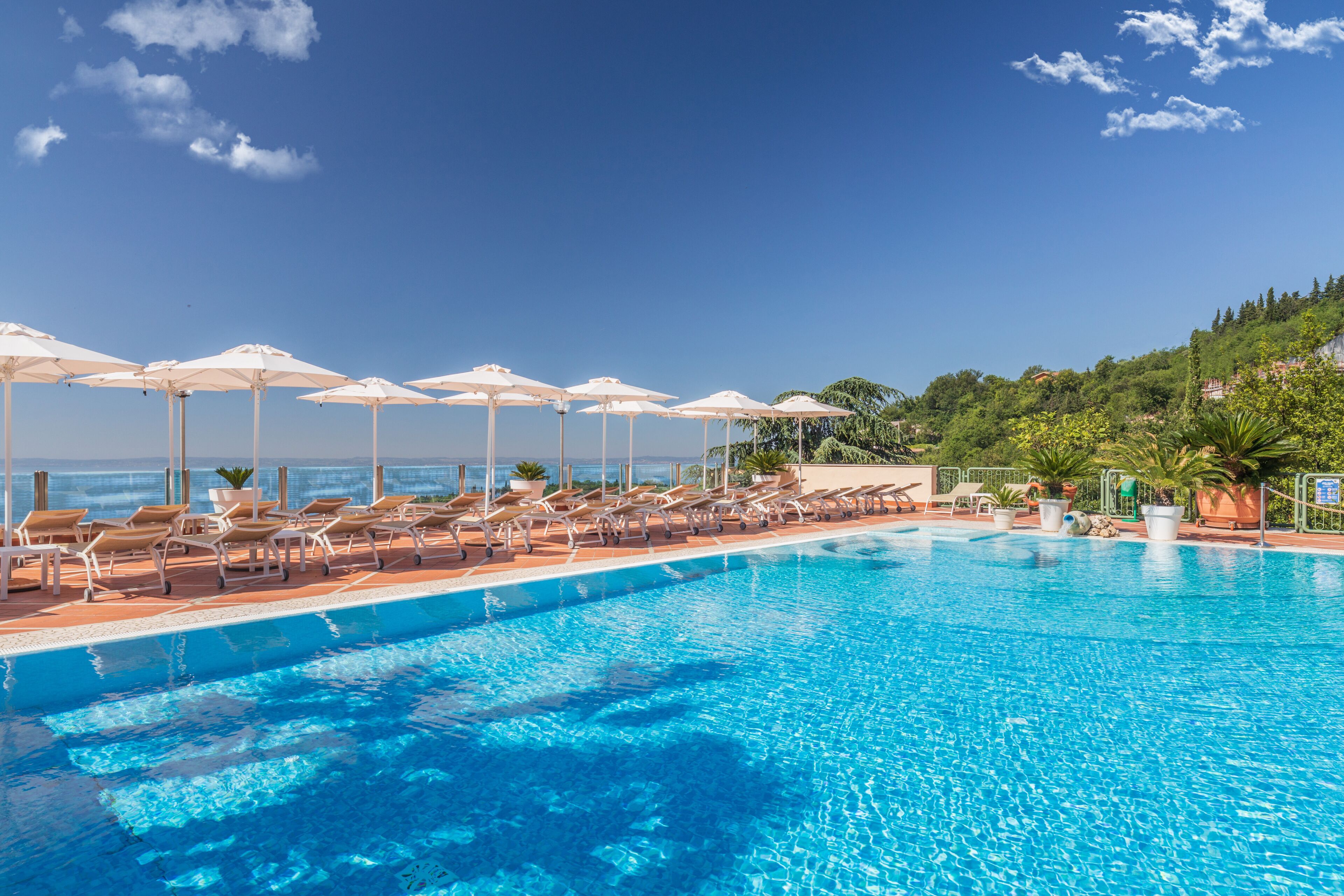 2 outdoor pools, pool umbrellas, pool loungers