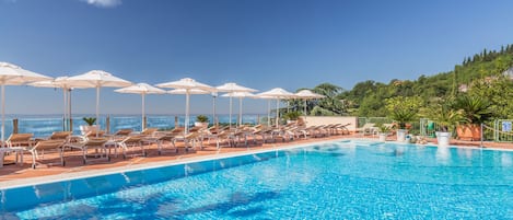 2 outdoor pools, pool umbrellas, pool loungers