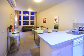 Two Bedroom One Bathroom Standard Apartment | Living area | LCD TV, DVD player - Flinders Landing Apartments (Melbourne)