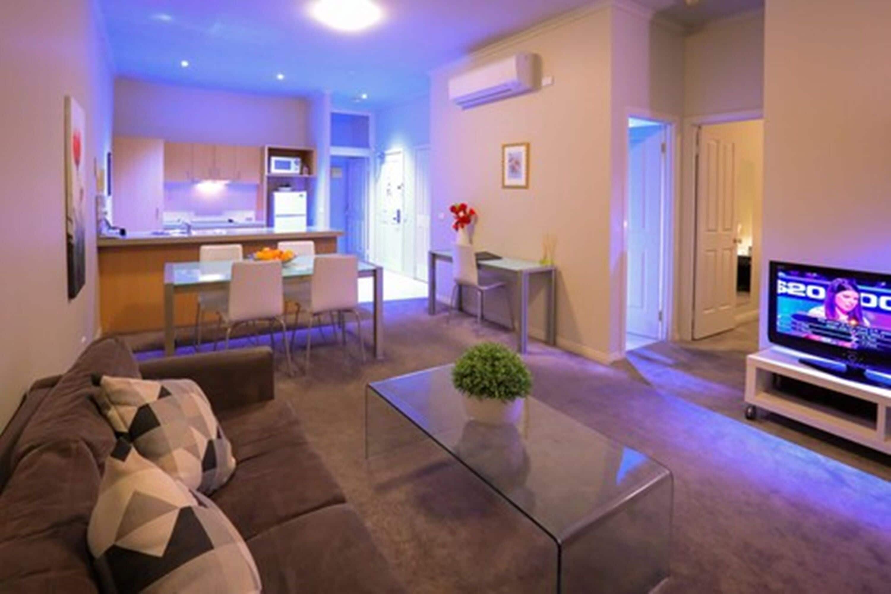 two bedroom one bathroom standard apartment | living area | lcd tv, dvd player