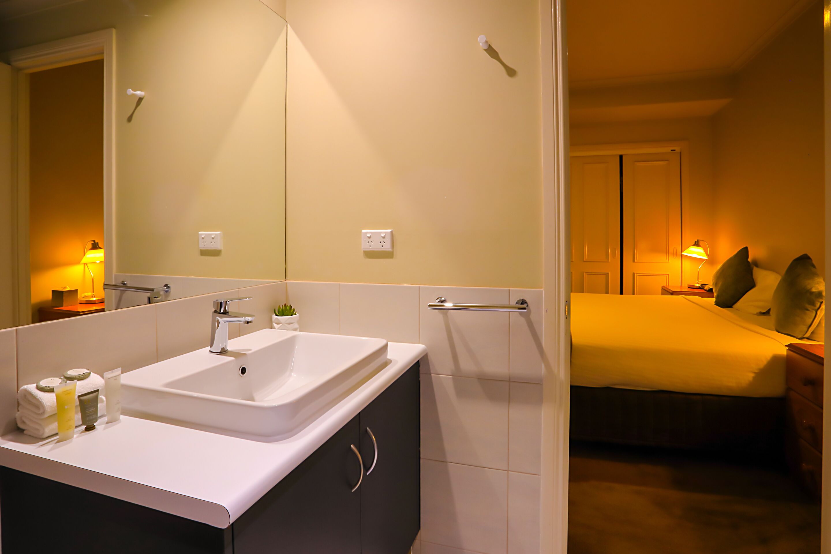 one bedroom basement apartment | bathroom | combined shower/bathtub, free toiletries, hair dryer, towels