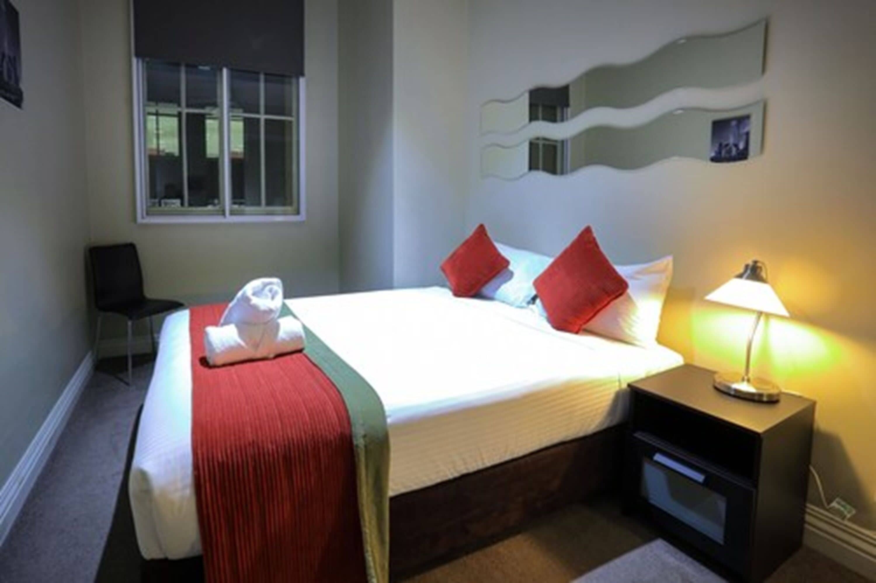 three bedroom two bathroom executive apartment | individually decorated, desk, blackout curtains, iron/ironing board