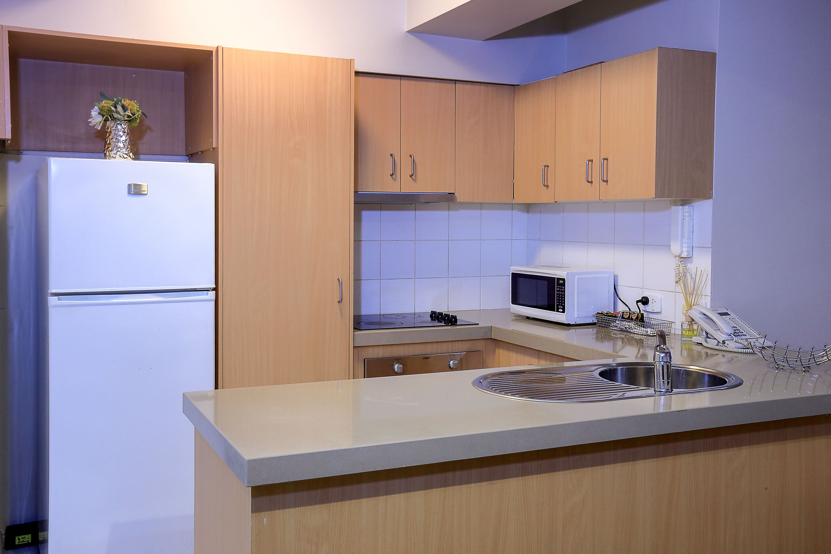 two bedroom basement apartment. | private kitchen | full-sized fridge, microwave, stovetop, dishwasher