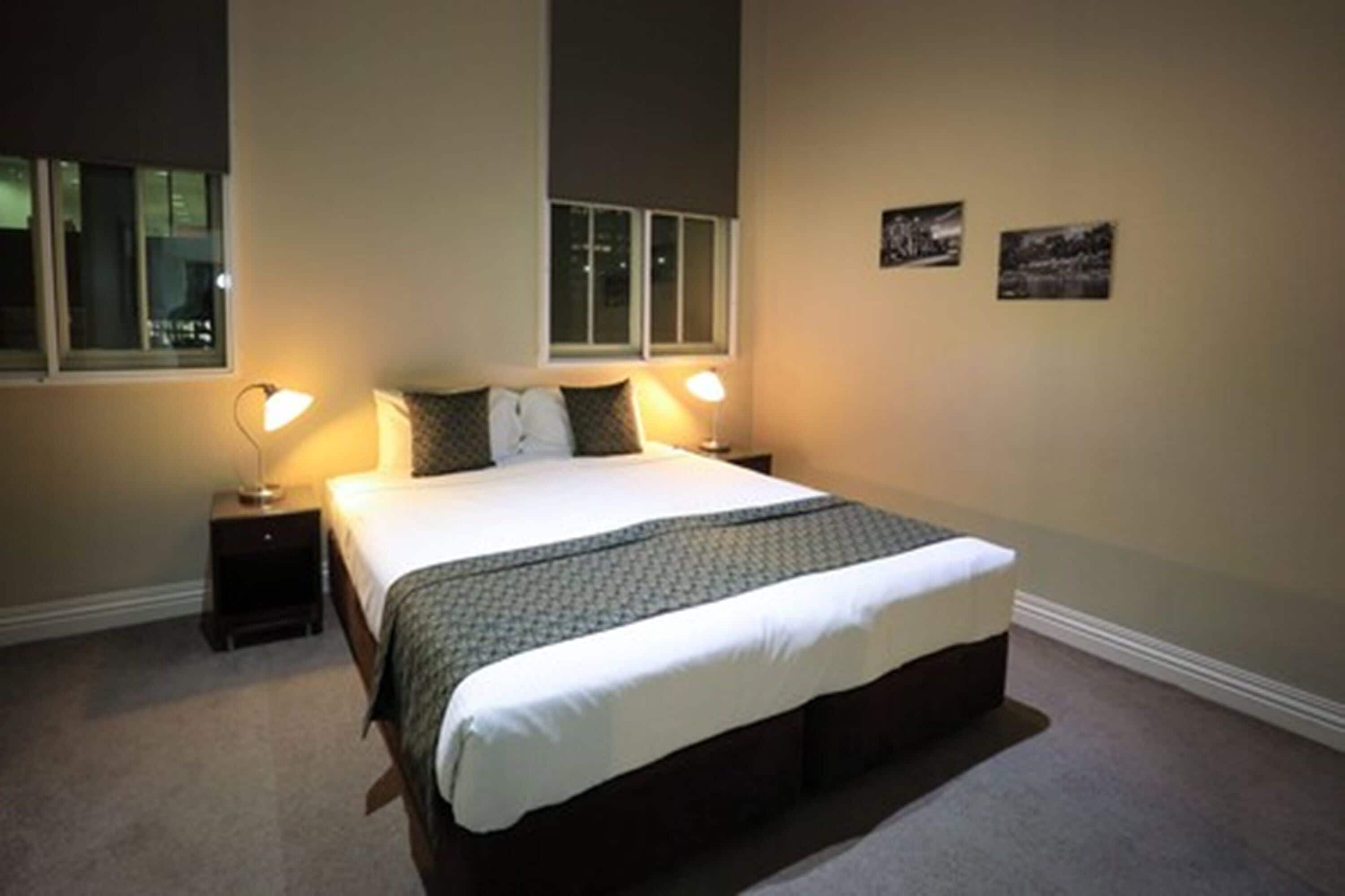 three bedroom two bathroom executive apartment | individually decorated, desk, blackout curtains, iron/ironing board