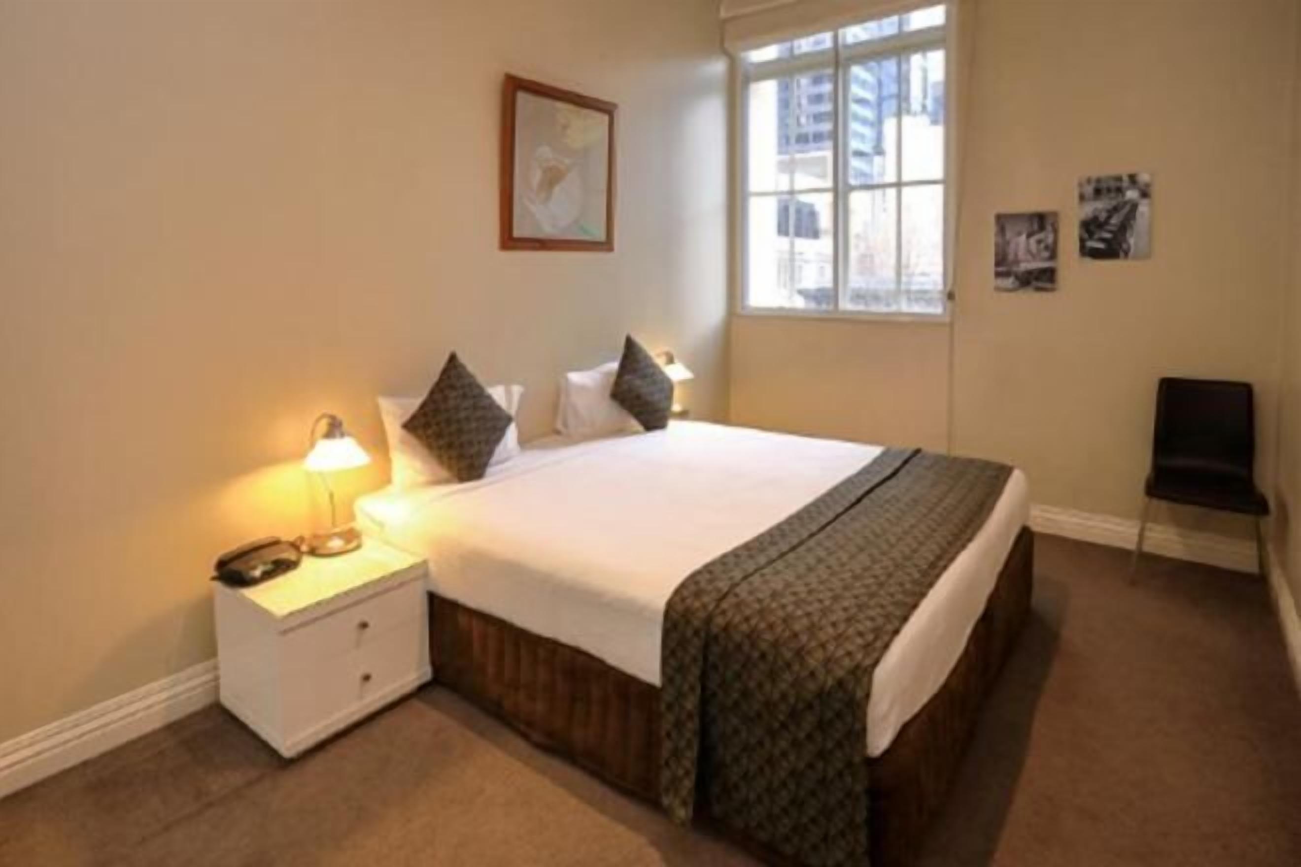 Individually decorated, desk, blackout curtains, iron/ironing board