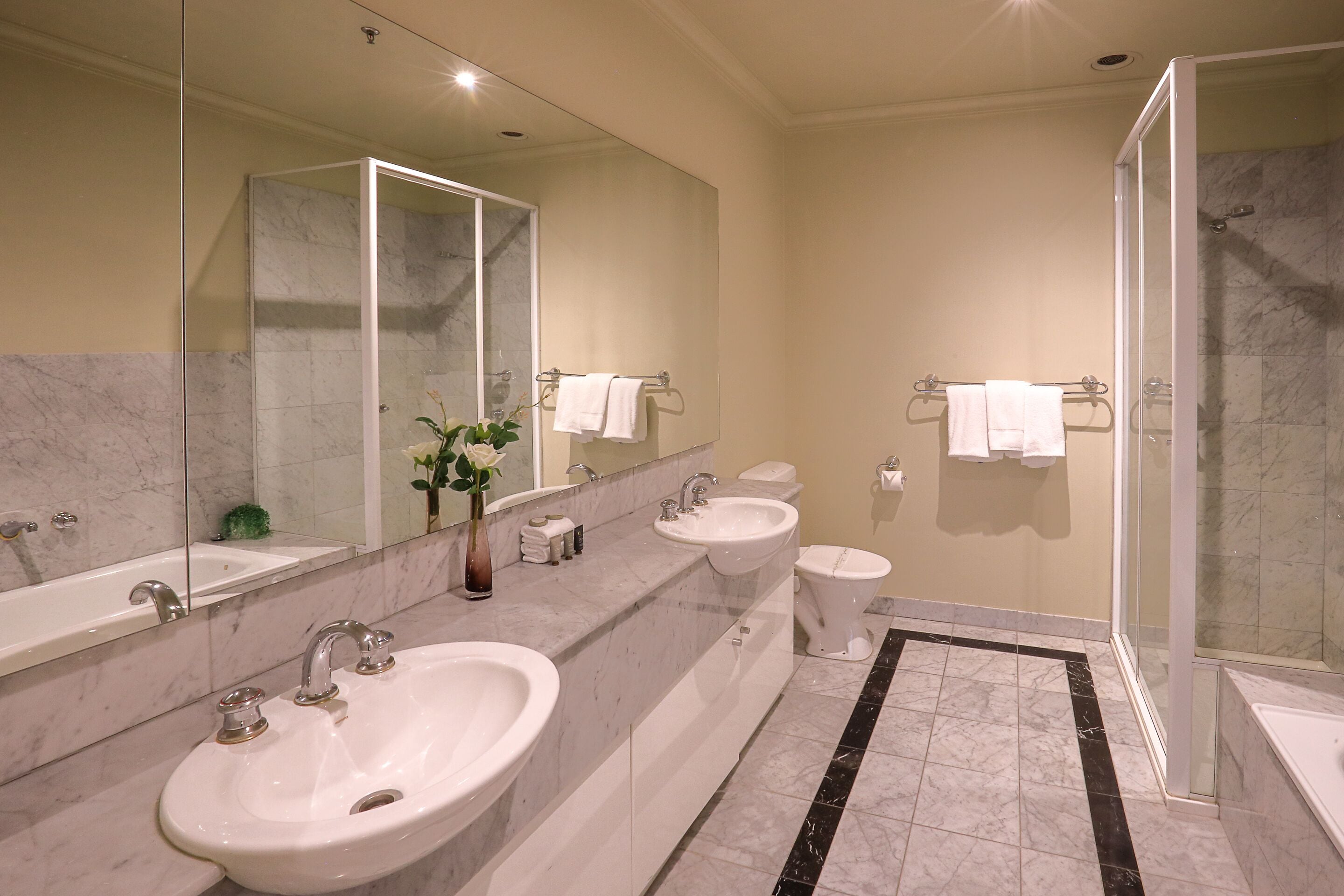 two bedroom two bathroom executive apartment | bathroom | combined shower/bathtub, free toiletries, hair dryer, towels