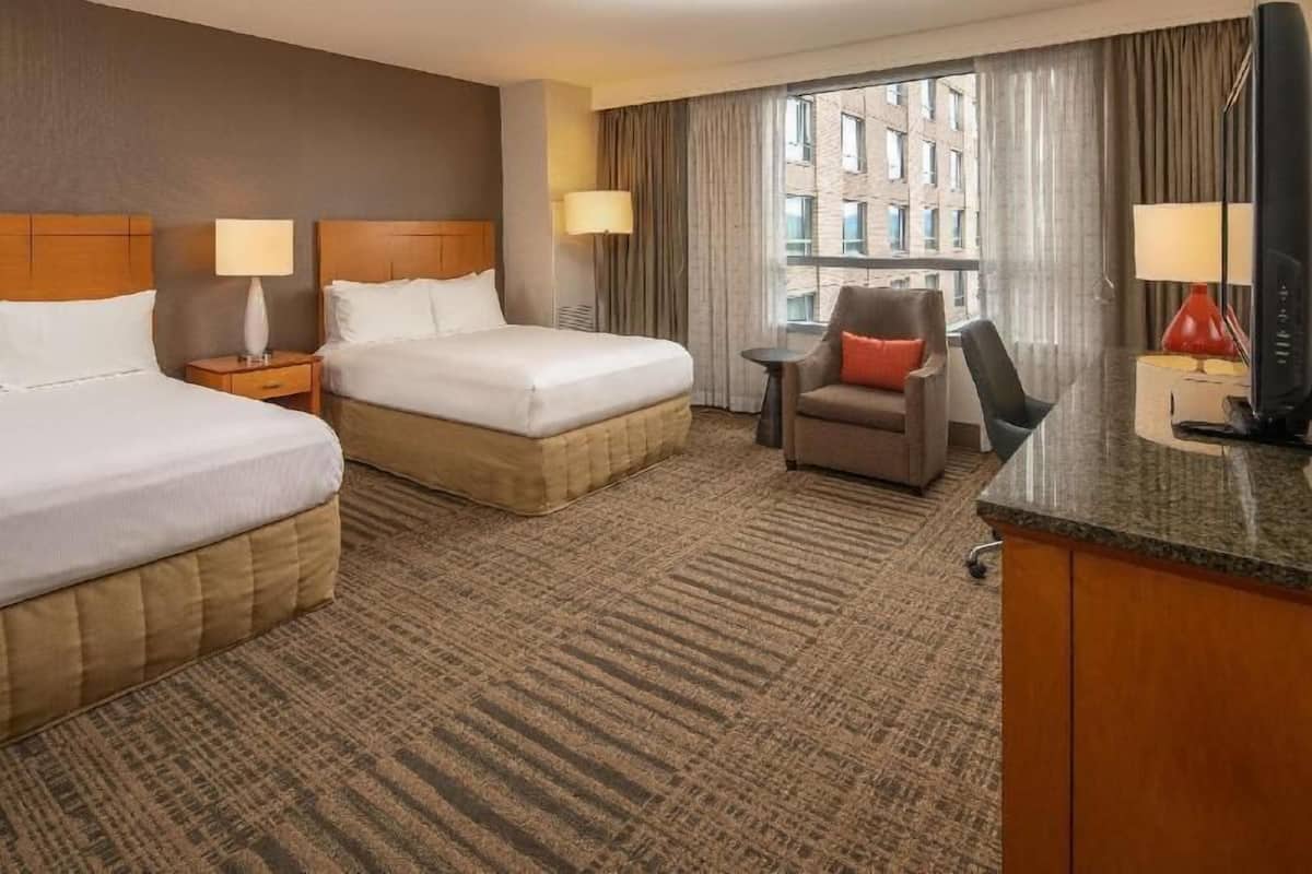 Premium bedding, pillowtop beds, desk, blackout drapes