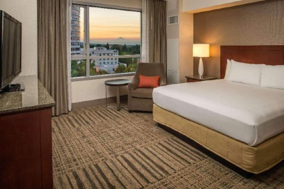 Premium bedding, pillow-top beds, desk, blackout curtains