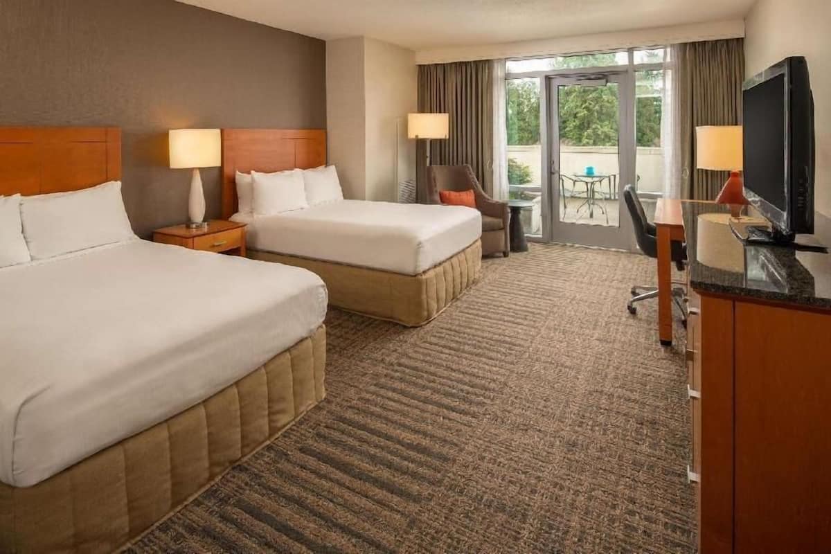 Premium bedding, pillowtop beds, desk, blackout drapes