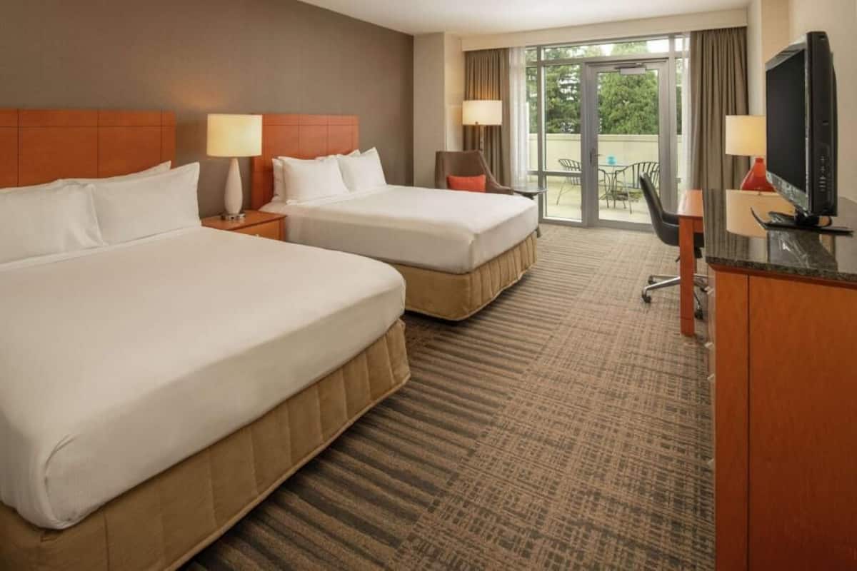 Premium bedding, pillowtop beds, desk, blackout drapes
