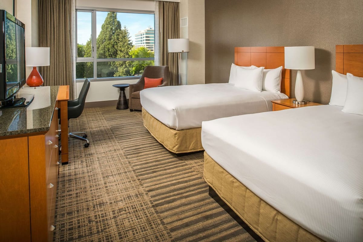 Premium bedding, pillowtop beds, desk, blackout drapes
