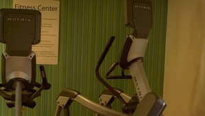 A fitness center with elliptical machines and a treadmill. - Holiday Inn Express & Suites Maryville by IHG (Maryville)
