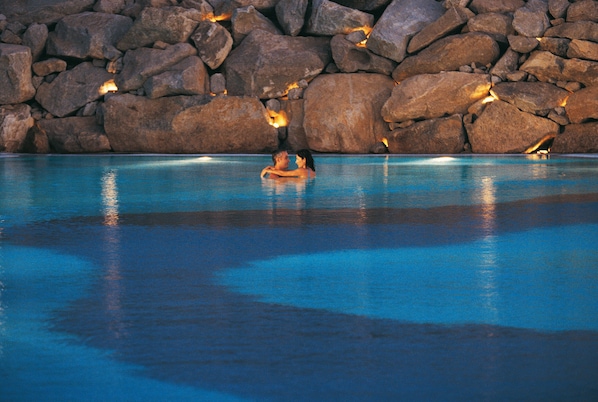 Seasonal outdoor pool, open 8:00 AM to 7:00 PM, free pool cabanas