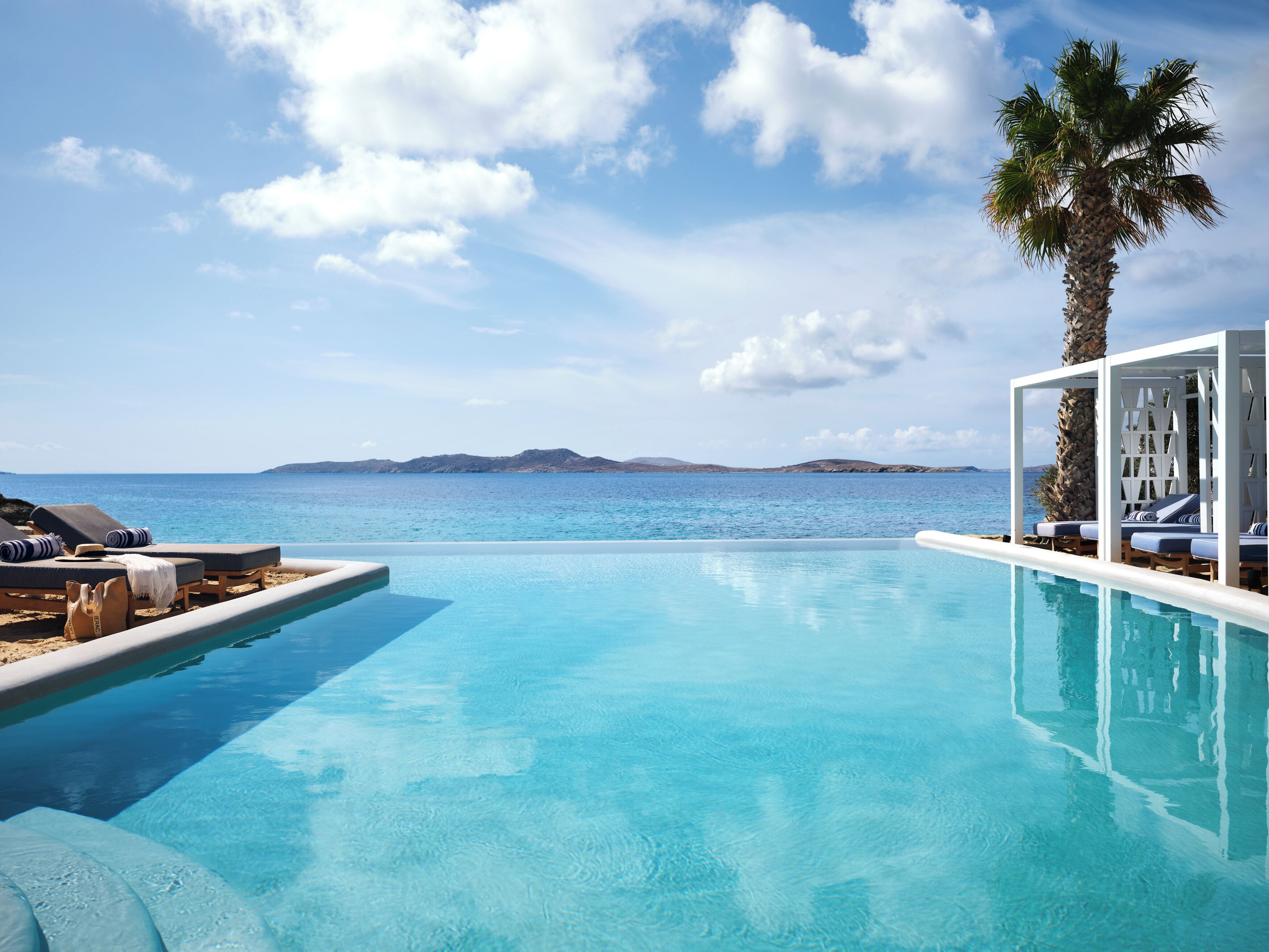 seasonal outdoor pool, open 8:00 am to 7:00 pm, free pool cabanas