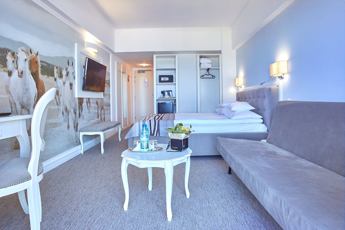 Deluxe Family Room with sofabed, sea view | 1 bedroom, minibar, in-room safe, desk