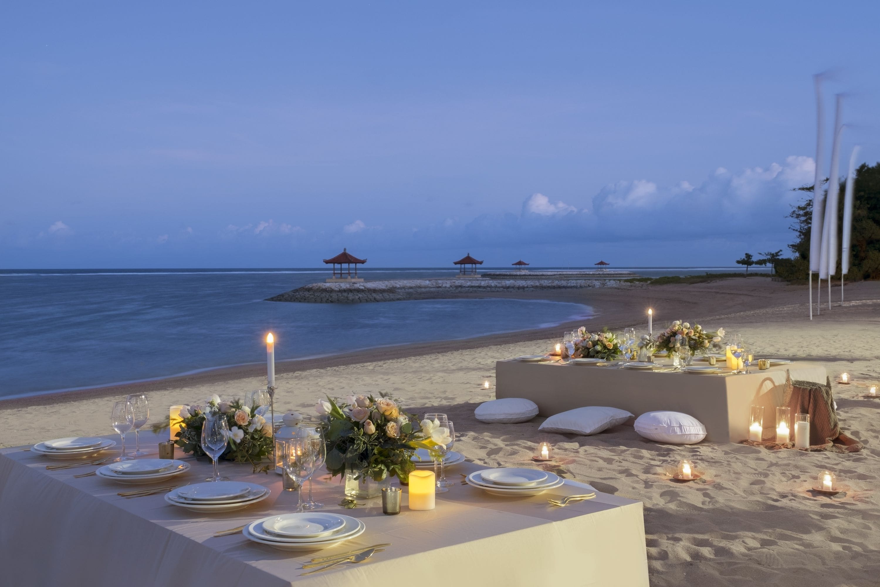 On the beach, white sand, sun-loungers, beach umbrellas