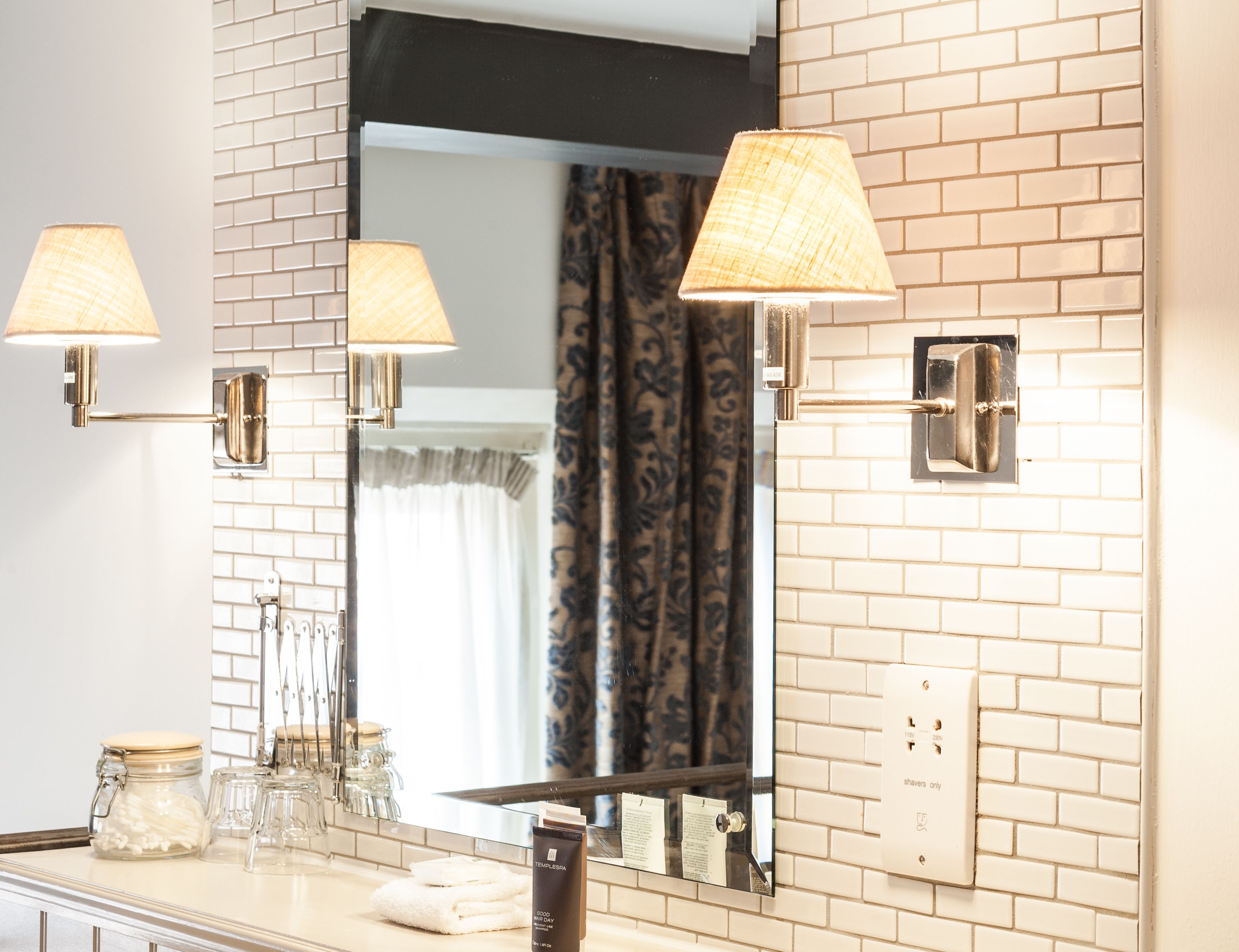 combined shower/bathtub, rainfall showerhead, designer toiletries