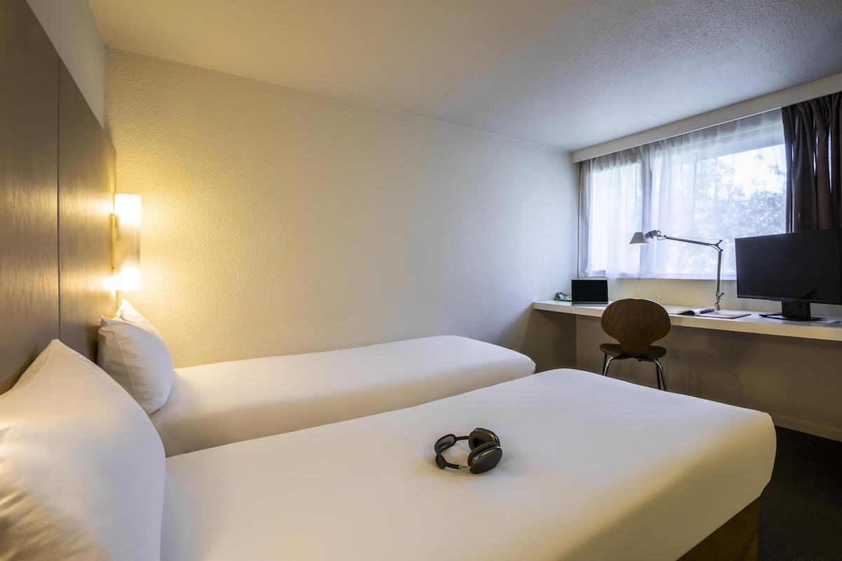 Premium bedding, desk, blackout curtains, soundproofing
