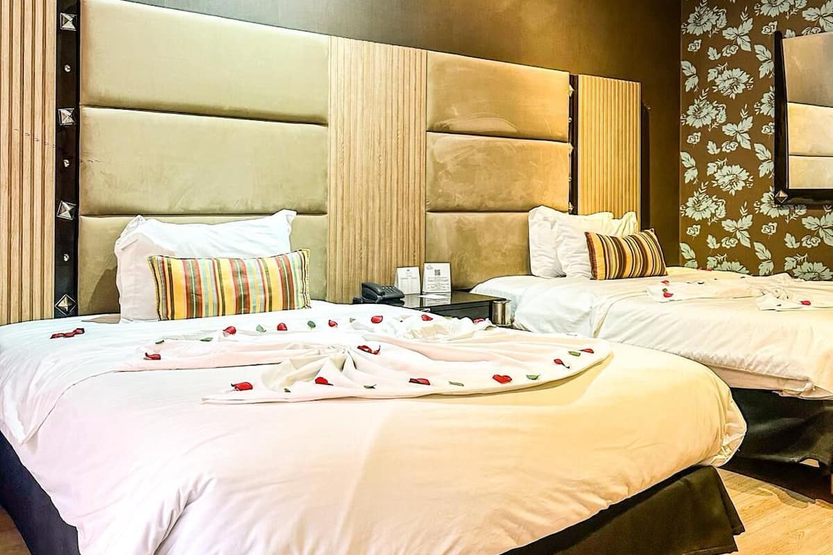 Habitación ejecutiva | Ropa de cama de alta calidad, minibar, caja fuerte