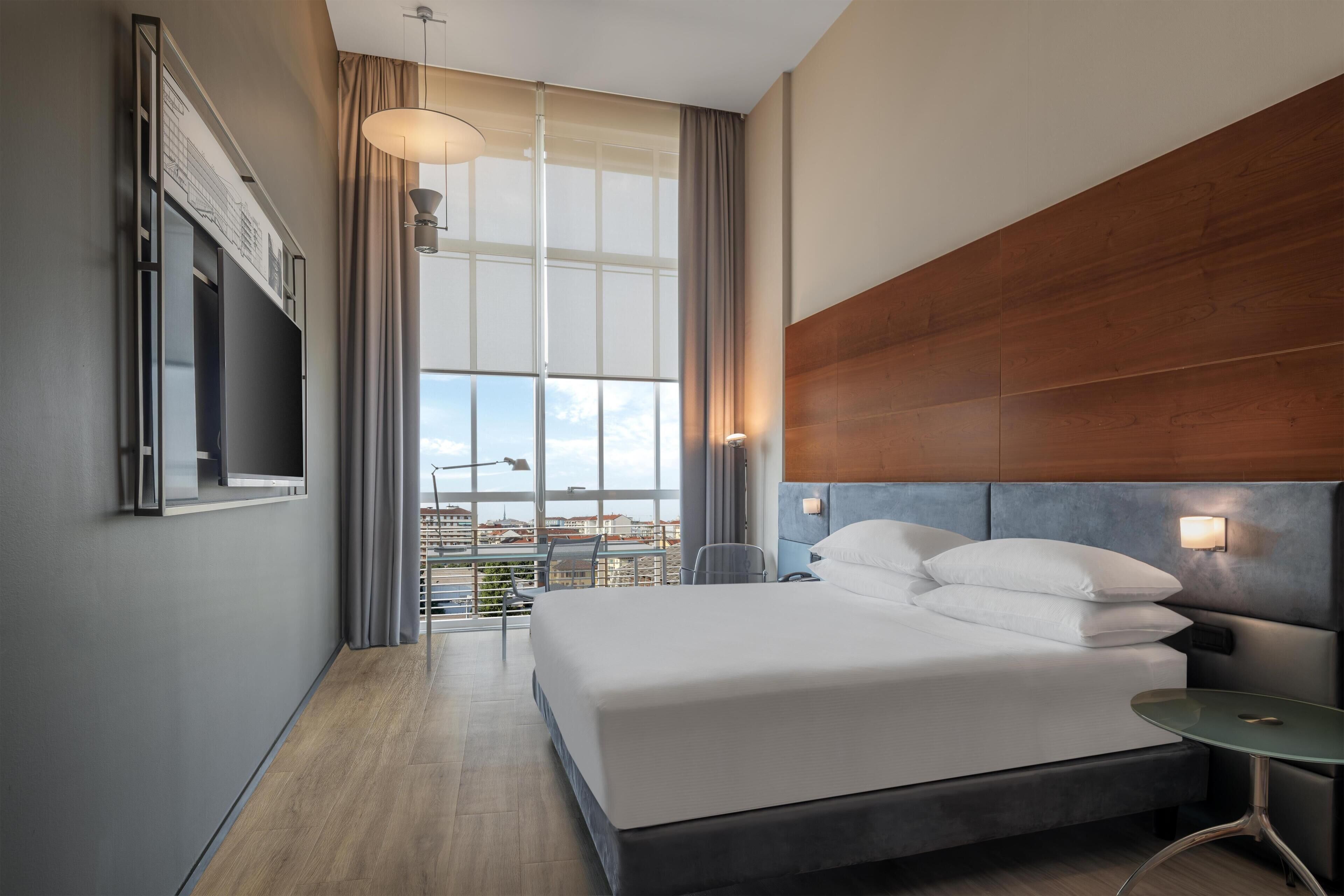 Hypo-allergenic bedding, down duvets, minibar, in-room safe