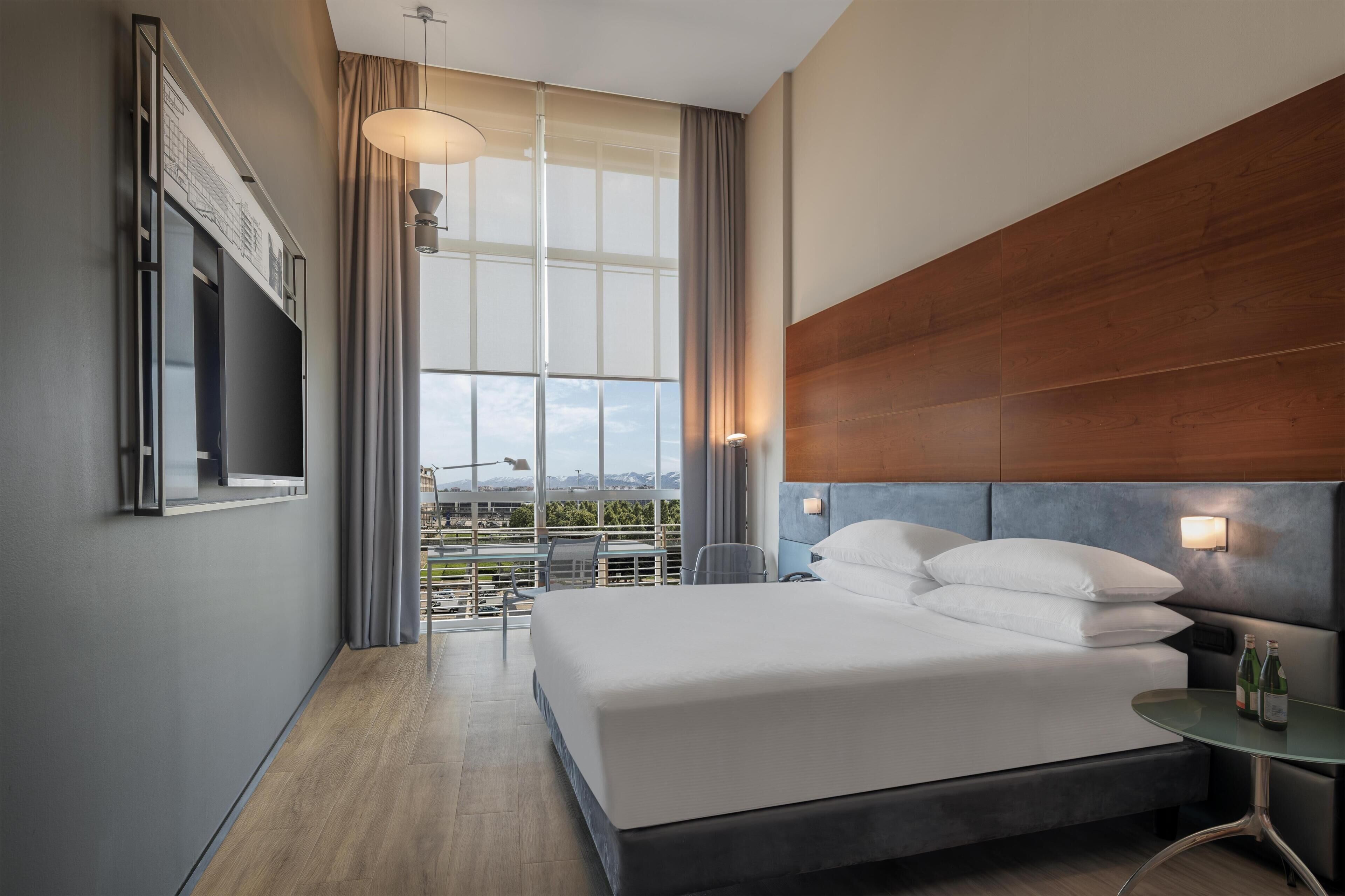 Hypo-allergenic bedding, down duvets, minibar, in-room safe