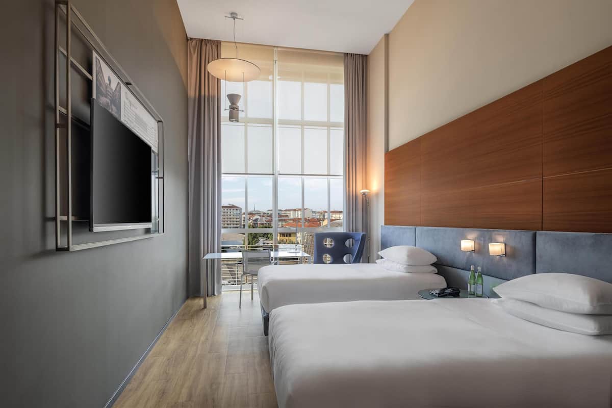 Hypo-allergenic bedding, down duvets, minibar, in-room safe