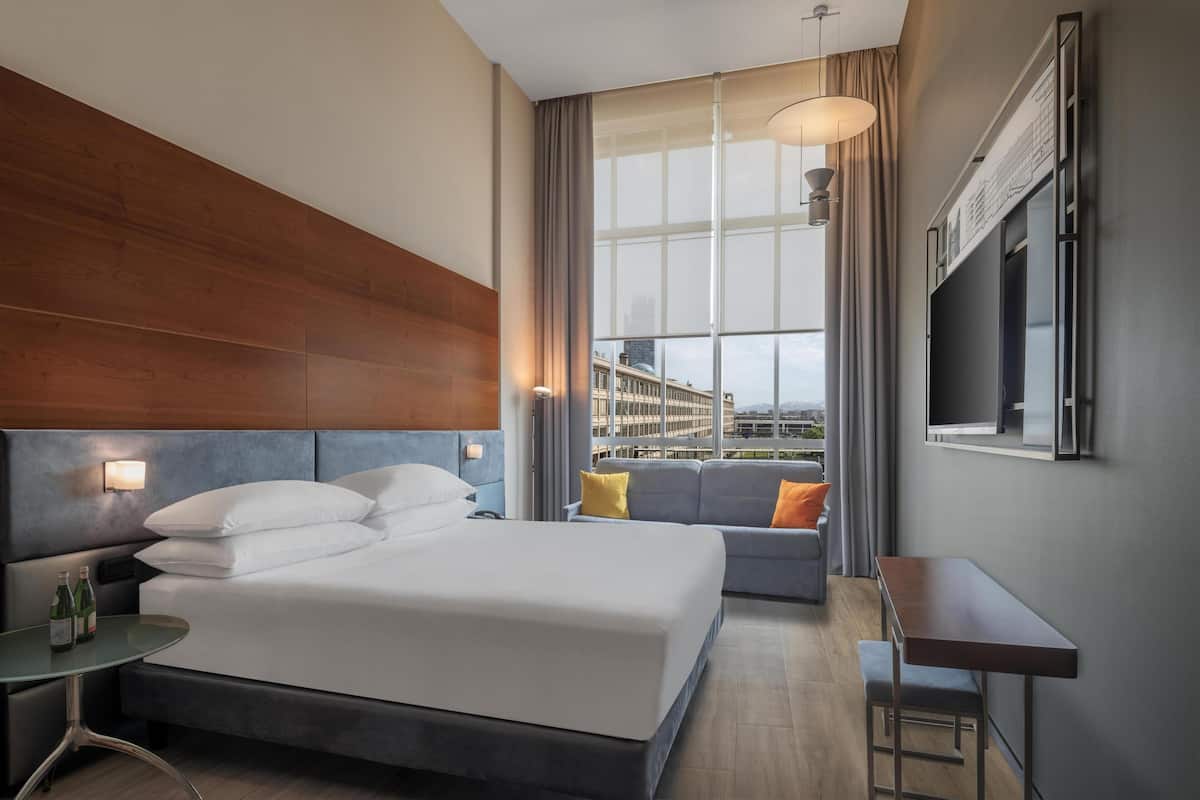 Hypo-allergenic bedding, down duvets, minibar, in-room safe