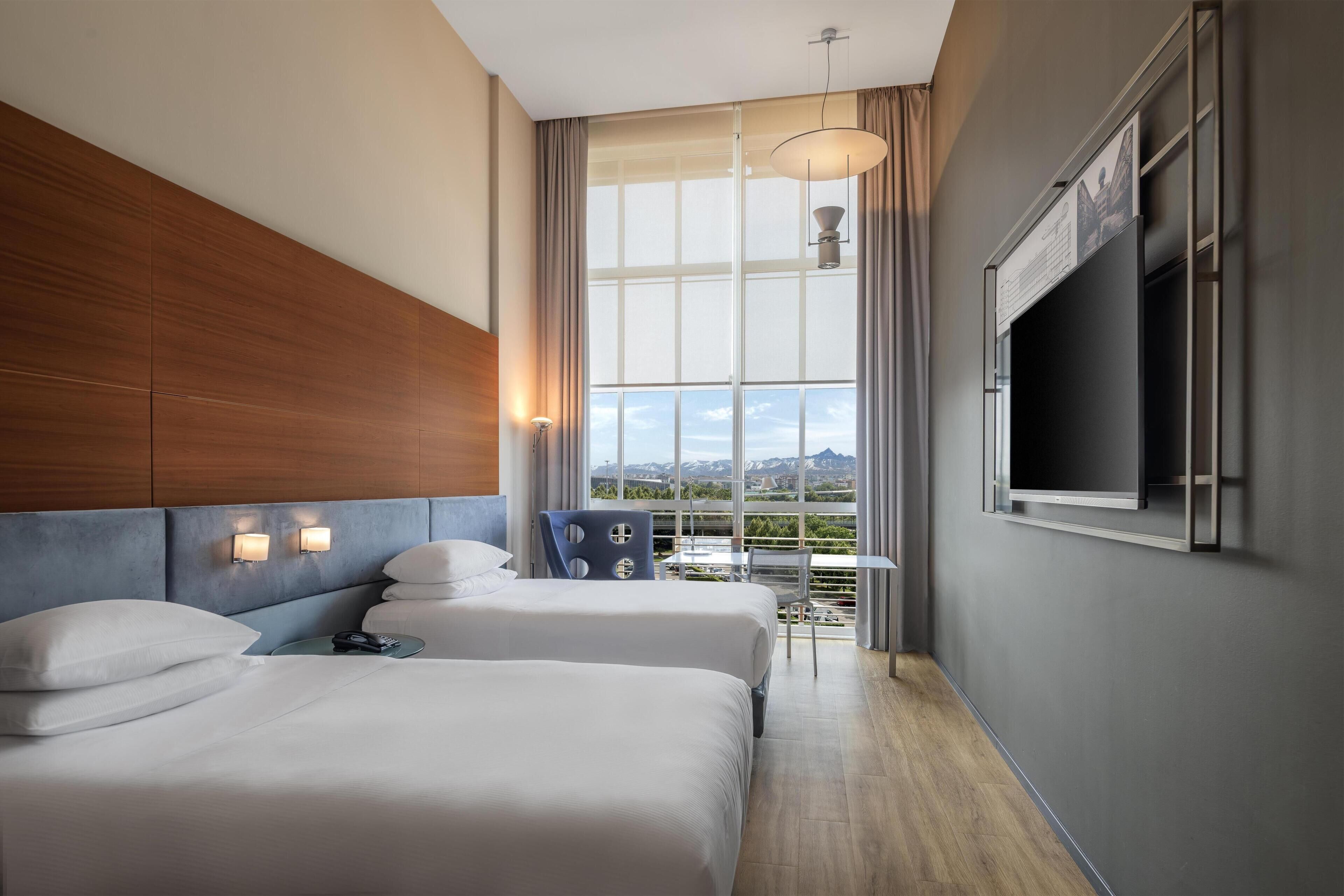 Hypo-allergenic bedding, down duvets, minibar, in-room safe